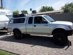 In fact you can sleep soundly in the bed of your truck with the added protection of a shell. 1st Gen Leer Silver Camper Shell With Thule Cargo Basket Tacoma World