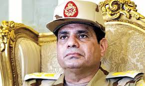 وزار السيسي القاعدة الجوية مرتديا الزي العسكري برفقة وزير الدفاع صدقي صبحي ووزير الداخلية مجدي عبدالغفار ورئيس أركان القوات المسلحة الفريق محمد فريد. Ø§Ù„Ø³ÙŠØ³ÙŠ Ø¨ÙŠÙ† Ø§Ù„Ø²ÙŠ Ø§Ù„Ø¹Ø³ÙƒØ±ÙŠ ÙˆØ§Ù„Ø±Ø¦Ø§Ø³Ø© Ø¹Ø§Ù„Ù… ÙˆØ§Ø­Ø¯ Ø¹ÙˆØ§ØµÙ… Ø§Ù„Ø¨ÙŠØ§Ù†