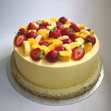 Coconut Sponge Cake Layered With Mango Passion Fruit Mousse And Pistachio Dacquoise Base Decorate Passion Fruit Cake Cake Decorating Tips Passion Fruit Mousse