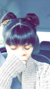 Then secure the bun with bobby pins and a rubber let your bangs fall onto one side of the forehead for a sleek look. Space Buns And Full Bangs Hairstyles With Bangs Full Bangs Hairstyle Hair Styles