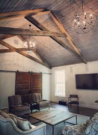 Scissor Truss Traditional Family Room Colour Schemes Other Metro Barn Doors Den Limestone Fireplace Reclaimed Beam Sk Home Roof Styles Traditional Family Rooms