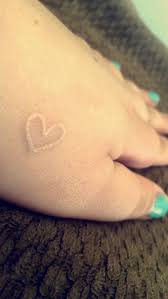 Small White Ink Heart Tattoo Heart Tattoo Tattoos White Ink