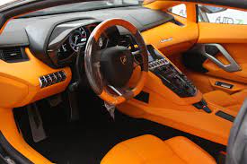 Welcome to the official account of automobili #lamborghini. Lamborghini Aventador Orange And Black Arancia Interior Lamborghini Aventador Lamborghini Lambo