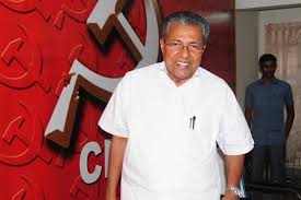 Kerala chief minister pinarayi vijayan greets party supporters during an election campaign ahead of kerala assembly polls, in thiruvananthapuram his daughter veena vijayan had tested positive for the virus on tuesday. Pinarayi Vijayan Partyman Pilots Ldf Win In Kerala Assembly Elections