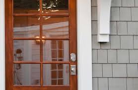 Stained wood trim dark wood trim natural wood trim wooden trim wooden doors interior desing interior trim interior doors. Best Front Door Color For A Gray House Gray House Door Colors