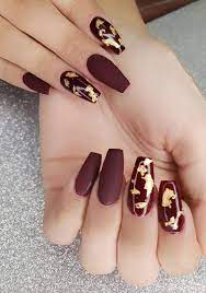 If you prefer keeping manicure short, then get acrylic nails. 15 Hottest Maroon And Gold Nails To Copy Checopie
