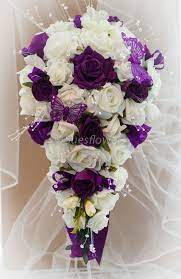 Purple and ivory wedding bouquets. Wedding Flowers Brides Teardrop Bouquet In Cadburys Purple Ivory Purple Wedding Flowers Flower Bouquet Wedding Wedding Flowers
