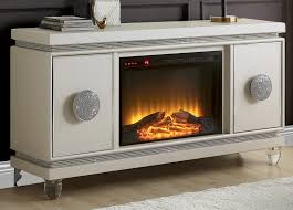 From mere utility gadgets, some of these appliances even if you are running a small office, this ivory electric fireplace can complement office décor too. Noralie Ivory Pu Leather Console Table With Electric Fireplace By Acme
