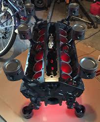 Coffee table television stand jaguar v12 engine. Jaguar V12 Engine Block Table Www Badassblox Com Car Part Furniture Car Parts Decor Automotive Decor