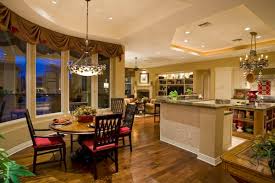 Green tone of the kitchen picture. Enhancing Your Kitchen Dining Area With A Round Table
