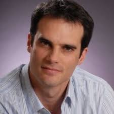 Nonlinear recurrent inhibition through facilitating serotonin release in  the raphe