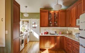 Over the kitchen since the current window is a series of 2 sliding windows with a central fixed window. A California Bungalow Kitchen Gets A Retro Style Redo