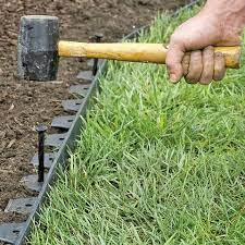 How to create an inexpensive mulch and stone walkway. No Dig Garden Edging Easyflex Landscaping Edging Free Shipping In 2020 Plastic Garden Edging Dig Gardens Garden Edging