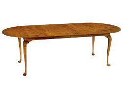 Oak parquet wood strips for an exceptional table. Queen Anne Style Round End Dining Table With Leaves Federalist