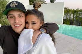 The pop icon shared photos of her intimate wedding to husband dalton gomez, after dating the real estate agent for over a year. Ariana Grande Dalton Gomez Relationship Timeline People Com
