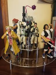 Ok so these pictures are my Star Wars collection and favorite cartoon  movies from my childhood with out display shelves now i got some acrylic  display shelves and now my collections look