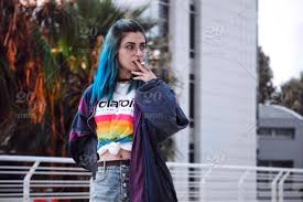 I agree that akira will default on the puberty thing and the bulma's hair was blue in the manga when she first appears then toriyama changed it to purple. Cute Blue Haired Girl Smoking In Urban Environment Stock Photo Cbef0f89 E4a9 4875 A677 8b9800489c87
