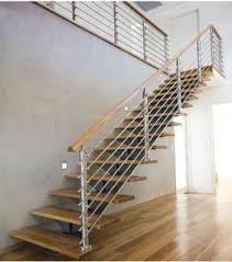 Concrete stairs and black steel railing. Stainless Cable Railing Wood Staircase Design Modern Staircase By Demax Staircase Railing Houzz