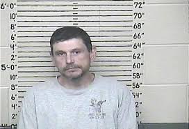 Former ambulance employee arrested