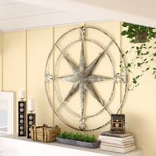 Find your way to artwork starring the compass whether it's found on maps, in portraits or with sailing ships. Large Compass Wall Decor Wayfair