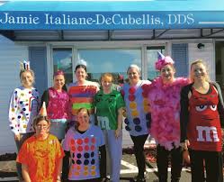 My Dental Office Dressed Up As Candy For Halloween Enjoy But Be Sure To Brush And Floss After Happyhallow Office Halloween Costumes Halloween Diy Costumes