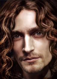 I want to depict a boy or girl standing in a dark hall. He or she is  surrounded by an arcade machine, a jukebox, a film screen, and other  "materialized" things, that