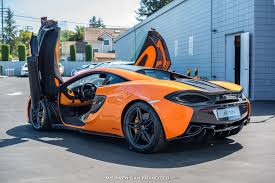 Ventura Orange Mclaren 570s Coupe By Mso Rear Side View Doors Up Gallery Mclaren 570s Mclaren Coupe