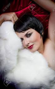 If you're stuck at home at the moment, why not use the time to plan your next short haircut? Seminude Beautiful Short Haired Brunette Woman Lying On Red Silk Stock Photo Picture And Royalty Free Image Image 14923767
