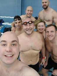 Friends complete six-hour swimming relay in memory of lifeguard Steven  Lewis