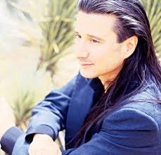 Steve Perry (Journey) added a new...