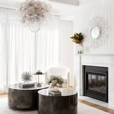 Single low bowl with flowers. How To Style A Coffee Table All Shapes Explained Tlc Interiors