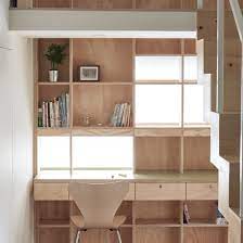 Space Saving Storage Solutions Are Built Into Room Partitions And Walls For Small Homes And Tiny Apart Office Furniture Design Futuristic Home Furniture Design