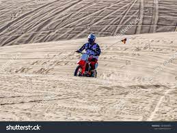 Dirt Bike Roff Road Motorcycle Riding A Sand Dune In The Imperial Sand Dunes Recreation Area Rcalifornia R19 Off Road Motorcycle Riding Motorcycle Dirt Bike
