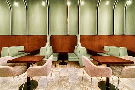 A Soft Warm Materiality Involes A Modern Yet Recognizable Diner Aesthetic With The Comfort Of A Living Ro Cafe Interior Interior Interior Design Living Room