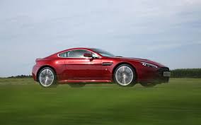 Image result for Amethyst Red 2011 Aston Martin