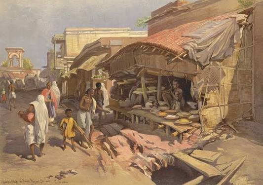 RBSI - Native shops in a Calcutta bazaar - 1867 This chromolithograph is taken from plate 39 of William Simpson's 'India: Ancient and Modern'. Simpson often included scenes of local colour in his paintings,