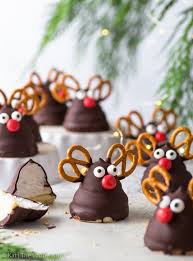 Rudolph Marshmallow Cookies Arranged On A White Surface And Upside Down White Ramekins With Fa Marshmallow Cookies Christmas Food Desserts Easy Holiday Treats