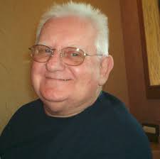 Delbert Huennekens Obituary