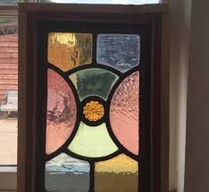 Round meditation stained glass window in teal with faceted crystals. Stained Glass Windows Authentic Reclamation