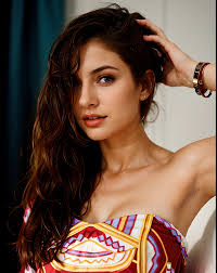 A very sexy girl, long light brown hair, light blue eyes, ,very sexy and  realis