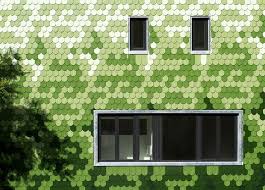 House Siding Idea Multiple Shades Of Green Shingles Cover This Building In Green Facade Facade Architecture Houses In Germany