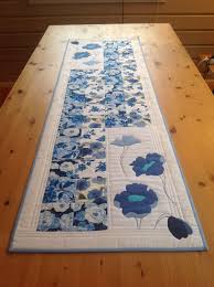 Lovely Blue And White Table Runner With Blue Floral Fabric And Blue Applique Flowers P Quilted Table Runners Christmas Quilted Table Runners Blue Table Runner