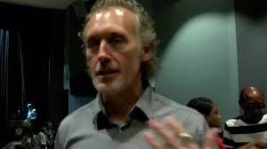 Audience members react to candidates' performance at PACE mayoral forum