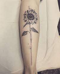 It's rather dark, and bold, drawing the eye immediately. 135 Sunflower Tattoo Ideas Best Rated Designs In 2021