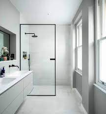 The bath stretches behind the shower to. 18 Modern Walk In Shower Ideas And Designs For 2021 Photos Showers Without Doors Walk In Shower Designs Doorless Shower