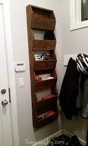 How big of a space do i need for hats and mittens? Easy Diy Mitten Storage Helps Us Stay Organized Tamaras Joy Storage Bins Diy Diy Rustic Wall Wooden Storage Bins