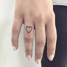Small Heart Tattoo By Gianina Caputo Inked On The Right Hand S Ring Finger Small Heart Tattoos Heart Tattoo Tattoos