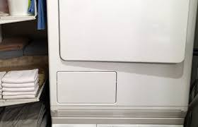Burning smell from tumble dryer. How To Clean A Condenser Dryer Step By Step Tutorial Olga S Laundry Blog