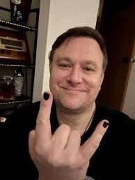 Ok Thriends! I'm a man who gives the people what they want. 😂 Black  fingers white thumbs. Base coat, two coats of polish and a top coat. Not  perfect, but I'm learning.