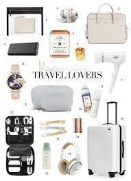 Holiday Gift Guide For Travel Lovers Meg Biram Travel Bag Essentials Gift Guide Travel Travel Lover